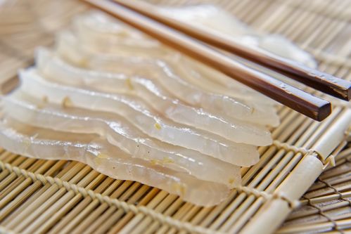 誘人牙簽魚片美食攝影圖，廣告素材下載